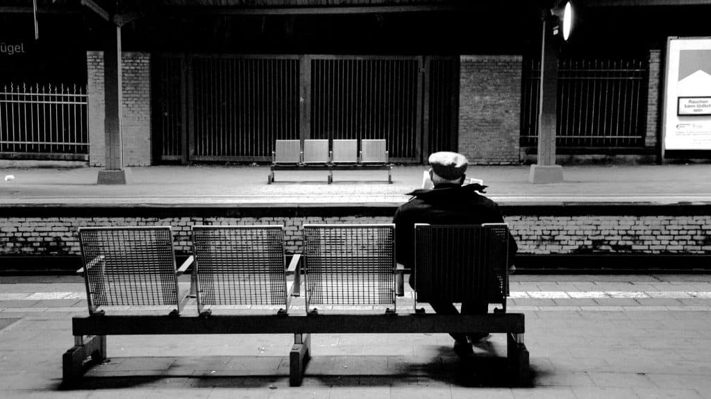 age discrimination old tired man resting bench